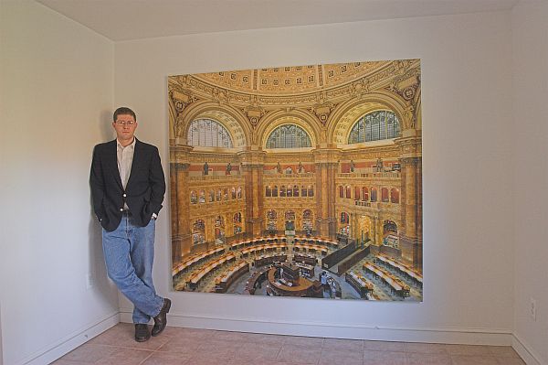 Lyons stands next to a 6x7 foot print of the Library of Congress